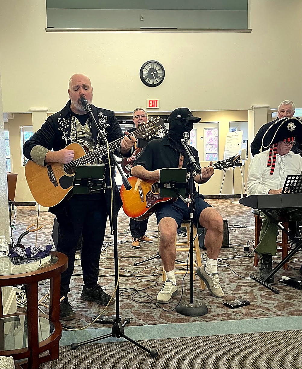 Brian, Rob, Mike, and David performing live