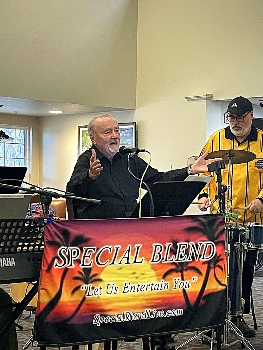 Mayo singing lead vocals by the Special Blend banner